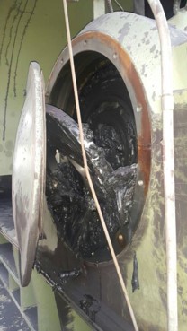 Damaged spherical roller bearing due to improper alignment, leading to premature wear and potential equipment failure.
